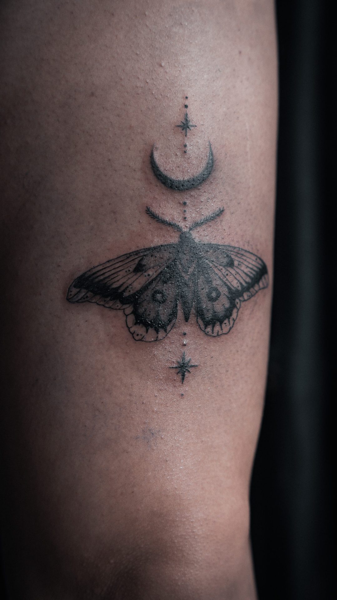 Moth tattoo