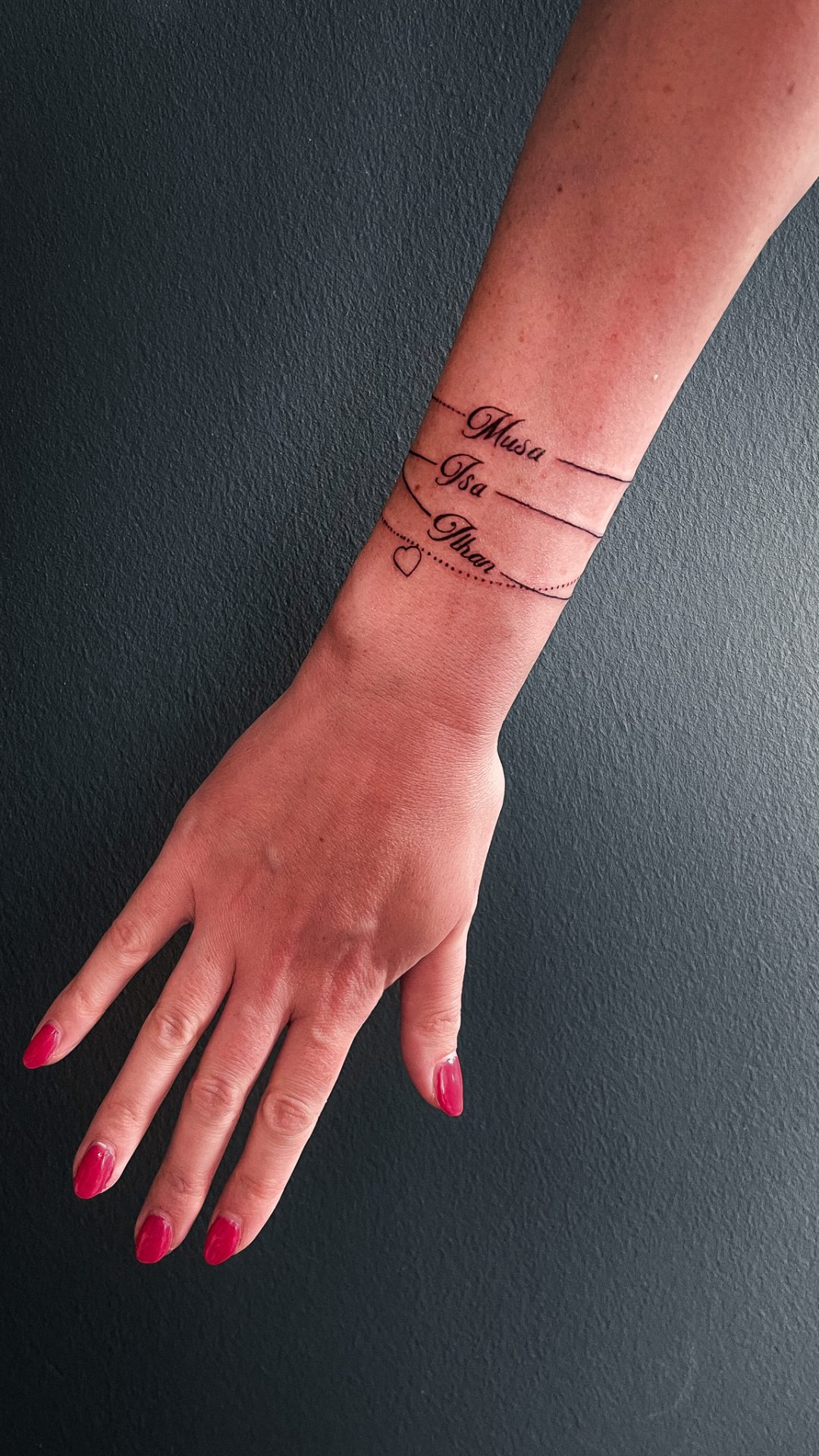 fineline tekst tattoo