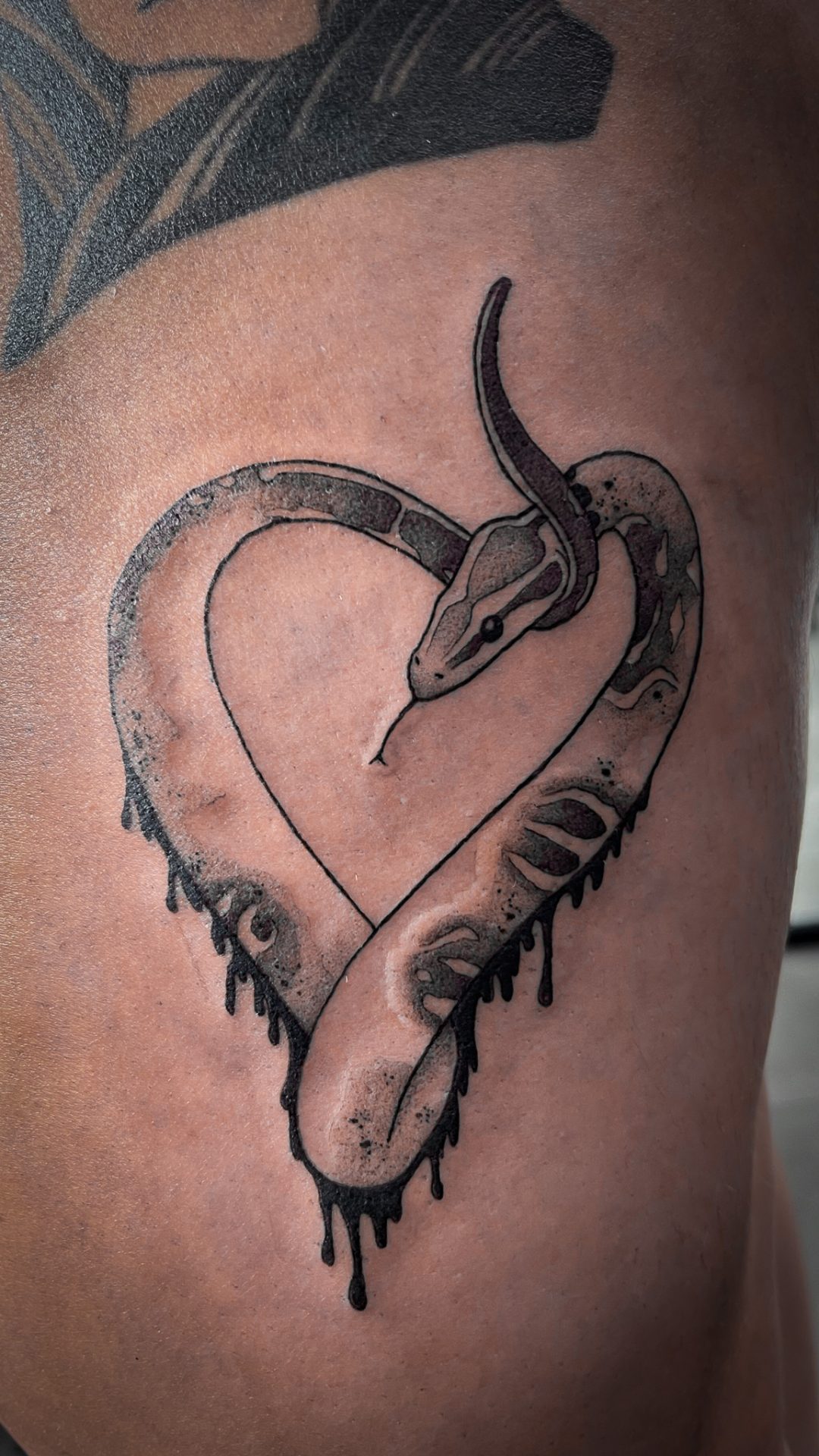 snake lover tattoo